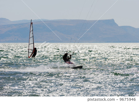 Sky-surfing and surfing on lake Kinneret 9675946