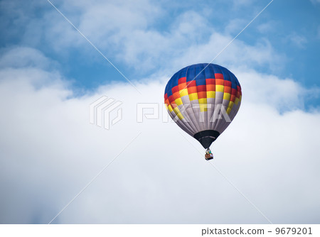 Multicolored Balloon in the blue sky Multicolored Balloon in the blue sky 9679201