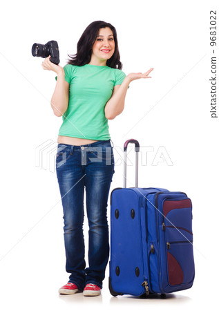 Young girl with travel case and camera 9681022