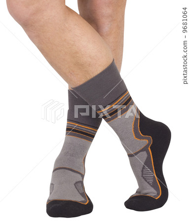 Male legs in socks. Isolated on white background Male legs in socks. Isolated on white background 9681064
