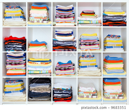 towels, bed sheets and clothes on the shelf towels, bed sheets and clothes on the shelf 9683351
