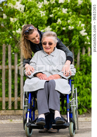 Young woman is visiting her grandmother in nursing home Young woman is visiting her grandmother in nursing home 9683365