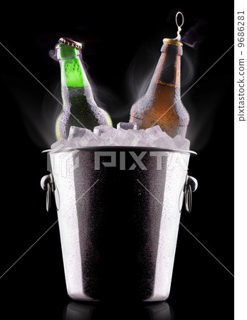 Beer bottles in ice bucket 9686281