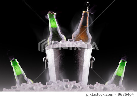 Beer bottles in ice bucket 9686404