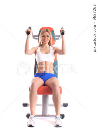 Smiling athlete exercising on isodynamic simulator 9687268