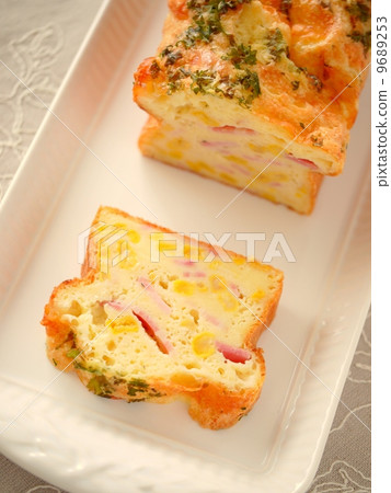 Corn and mozzarella cake shale (vertical position high angle) 9689253