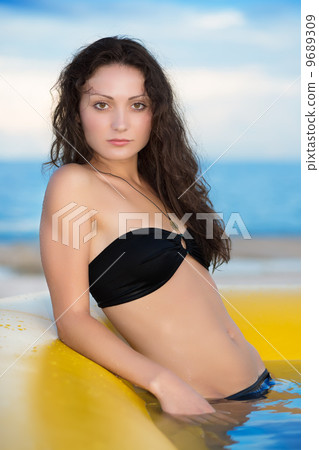 Young sexy brunette 9689309