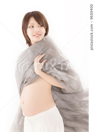 A fresh smile wearing a gray cloth wonderful young pregnant woman 9689400