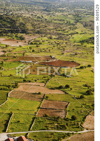 Aerial view at farm fields Aerial view at farm fields 9689529