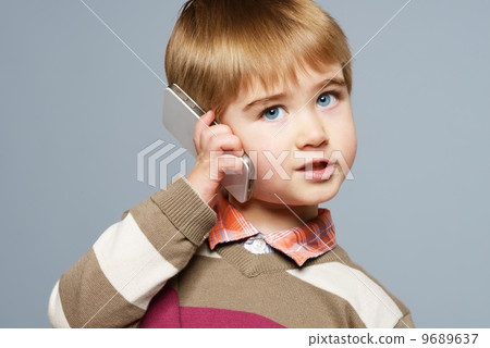 Little boy with mobile phone 9689637
