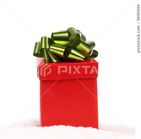 Red gift box with green-golden bow. 9690094