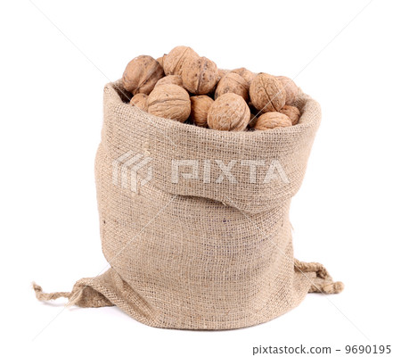 Sack full of walnuts. Close up. 9690195