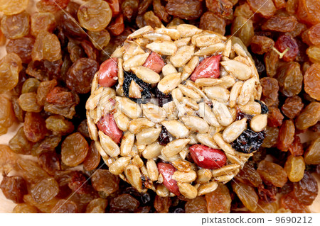 Round candied seeds and nuts with raisins. Round candied seeds and nuts with raisins. 9690212