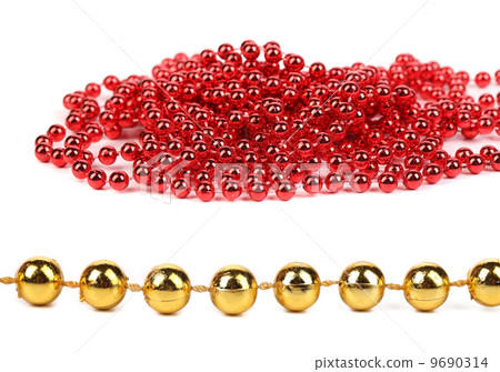 Bunch of red beads and golden row. Bunch of red beads and golden row. 9690314