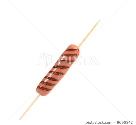 Sausage roll grilled on stick. Sausage roll grilled on stick. 9690542