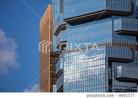 Modern glass silhouettes on modern building. 9691577