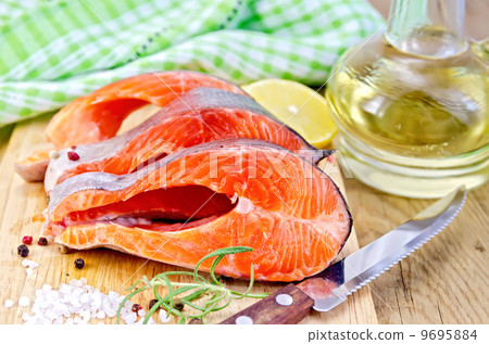 Trout on board with oil and salt Trout on board with oil and salt 9695884