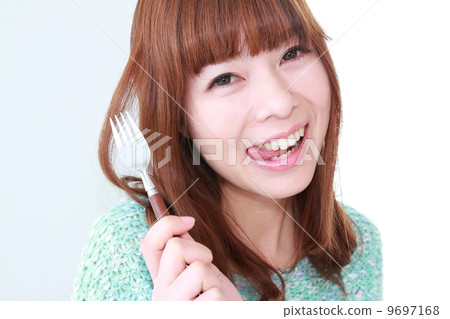 一個半長的女人用叉子 一個半長的女人用叉子 9697168