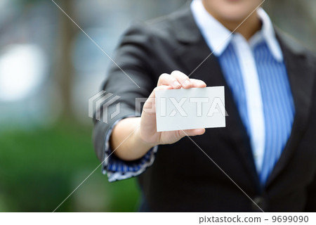 Business woman outdoor showing off name credit card cash ATM for edge out shallow depth of field Business woman outdoor showing off name credit card cash ATM for edge out shallow depth of field 9699090