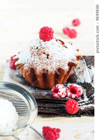 Fruitcake Decorated by Raspberry and icing sugar 9699686