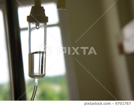 Infusion bottle with IV solution in hospital Infusion bottle with IV solution in hospital 9701767