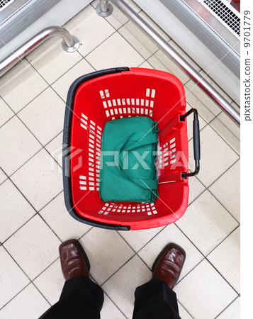 empty shopping basket at supermarket 9701779
