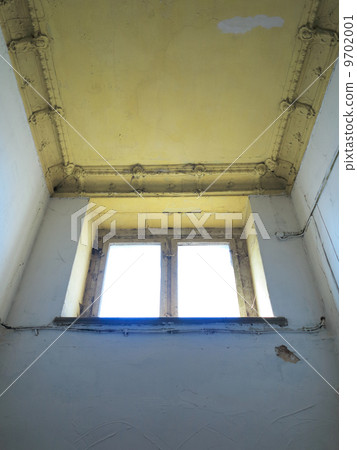 Damaged ceiling in an old abandoned home Damaged ceiling in an old abandoned home 9702001