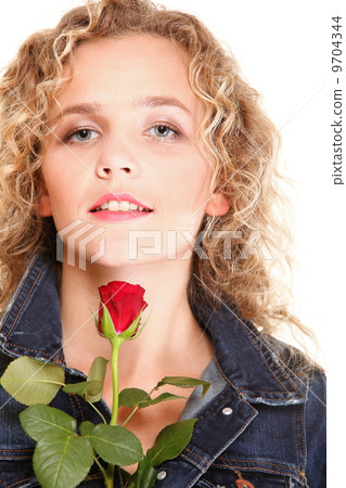 Beautiful young woman blonde in portrait romantic red rose isola Beautiful young woman blonde in portrait romantic red rose isola 9704344