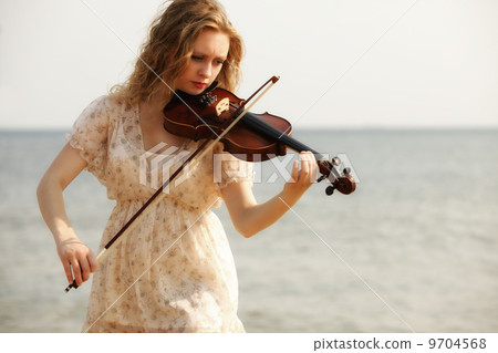 Portrait blonde girl with a violin outdoor Portrait blonde girl with a violin outdoor 9704568