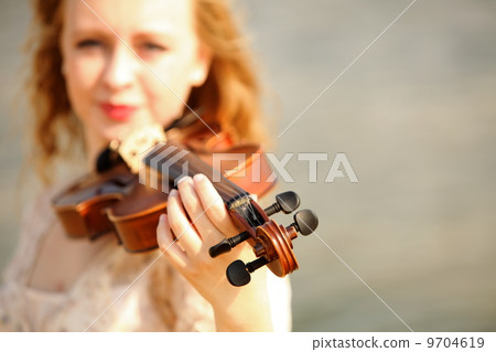 Portrait blonde girl with a violin outdoor Portrait blonde girl with a violin outdoor 9704619