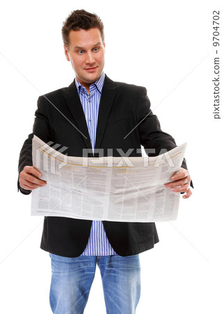 Businessman reading a newspaper isolated 9704702