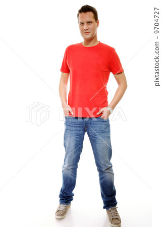 Young guy with hands in pockets isolated 9704727