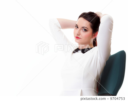 Portrait serious business woman sitting on chair 9704753