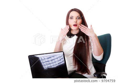 business woman reading bad news at laptop 9704759