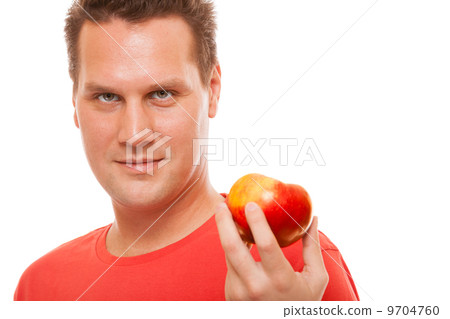 Happy man in red shirt holding apple. Diet health care healthy nutrition. Happy man in red shirt holding apple. Diet health care healthy nutrition. 9704760
