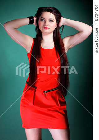 woman long hair red dress on green fashion 9704804