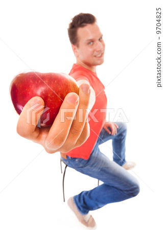 Happy man in holding offering apple. Diet health care healthy nutrition. 9704825