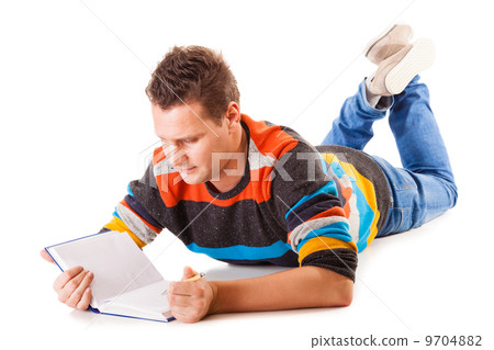male student reading a book preparing for exam isolated male student reading a book preparing for exam isolated 9704882
