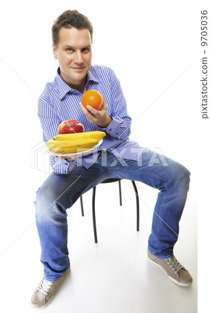 young man with fruits healthy diet isolated 9705036