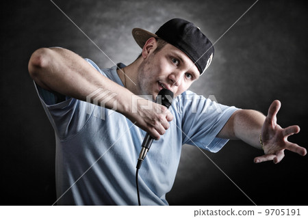 Rap singer man with microphone cool hand gesture 9705191