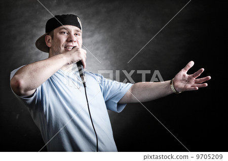 Rap singer man with microphone cool hand gesture 9705209