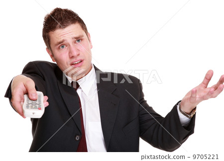 man with remote control changing channel 9705221
