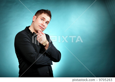 young pensive man with headphones young pensive man with headphones 9705263