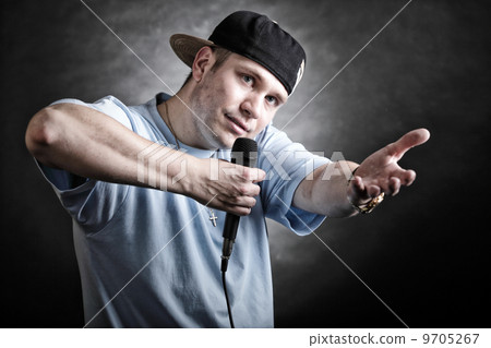 Rap singer man with microphone cool hand gesture 9705267