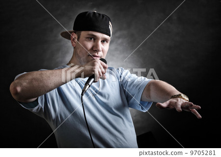 Rap singer man with microphone cool hand gesture 9705281