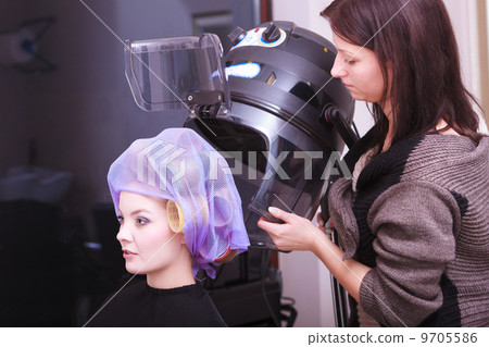 Beautiful blond girl hair curlers rollers hairdresser beauty salon Beautiful blond girl hair curlers rollers hairdresser beauty salon 9705586