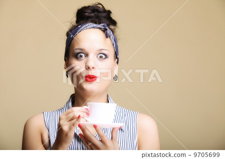 Hot beverage. Woman holding tea or coffee cup Hot beverage. Woman holding tea or coffee cup 9705699