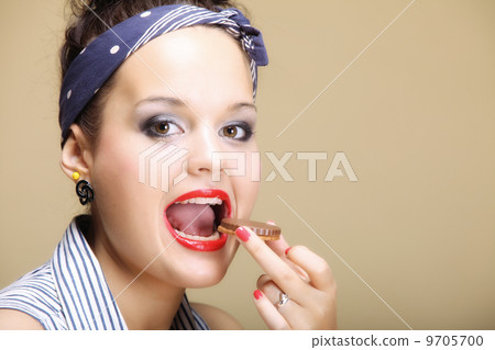 Diet and health. Lovely housewife eating sweets cake Diet and health. Lovely housewife eating sweets cake 9705700