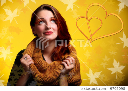 Fashionable girl with autumnal creative makeup dreaming about love Fashionable girl with autumnal creative makeup dreaming about love 9706098