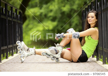 woman roller skating sport activity in park 9706545